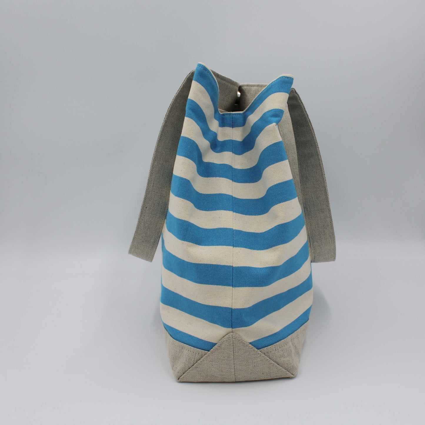 Blue striped beach bag side view